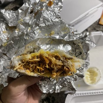 Nicole’s Arepas & Sabor - a hand holding a sandwich - Colombian Near Me - Elizabeth, New Jersey Nicole’s Arepas & Sabor - a hand holding a sandwich - Colombian Near Me - Elizabeth, New Jersey