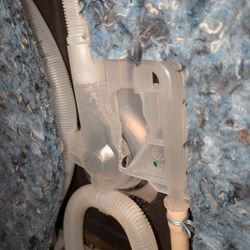 DTX Appliance Repair - Plastic part that a mouse had eaten away allowing water to leak out the side.