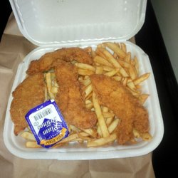Gino's Pizza & Spaghetti - Huge portion of fries, chicken fingers, and coleslaw. Tasty too!