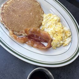 a breakfast of pancakes, eggs and bacon a breakfast of pancakes, eggs and bacon