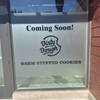 Dirty Dough - the reflection of a person in a window - Desserts Near Me - Dana Point, California Dirty Dough - the reflection of a person in a window - Desserts Near Me - Dana Point, California