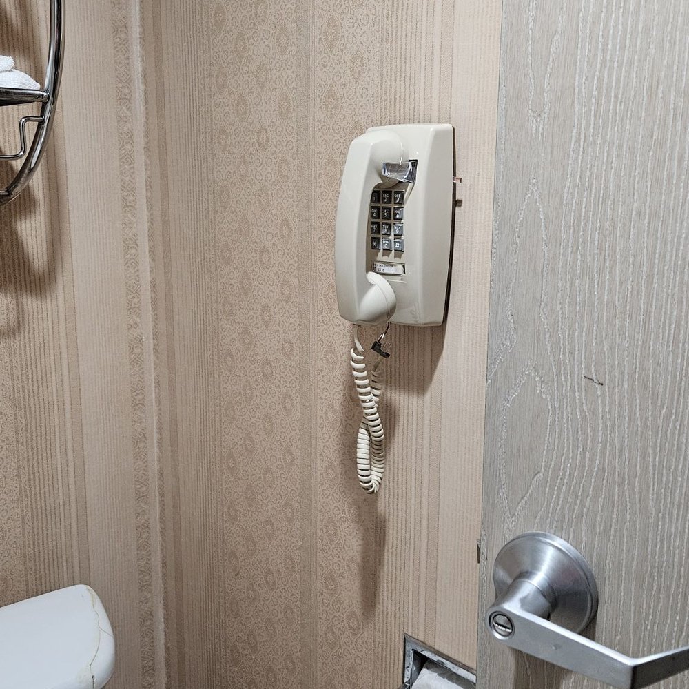 Quality Inn - Old fashioned wall phone - Hotels Near Me - Dumas, Texas Quality Inn - Old fashioned wall phone - Hotels Near Me - Dumas, Texas