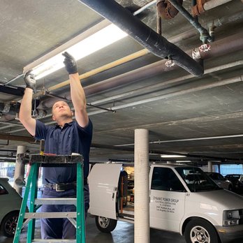 Dynamic Power Group - Commercial electrician. Maintenance free parking lights installation with LED tubes - Electricians Near Me - Los Angeles, California Dynamic Power Group - Commercial electrician. Maintenance free parking lights installation with LED tubes - Electricians Near Me - Los Angeles, California