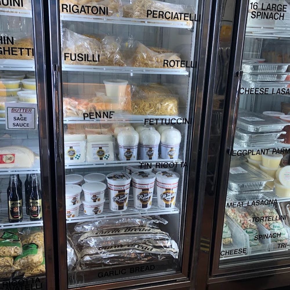 Antoni Ravioli - Fridge view 2nd to bottom many Cheeses and containers for sale - Specialty Food Near Me - North Massapequa, New York Antoni Ravioli - Fridge view 2nd to bottom many Cheeses and containers for sale - Specialty Food Near Me - North Massapequa, New York