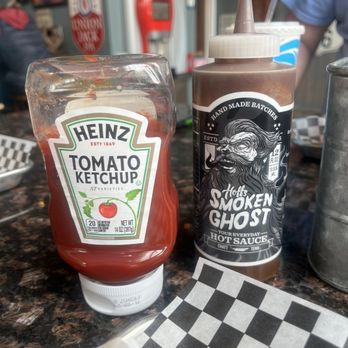 Rustwater Kitchen & Taproom - One of their hot sauces and condiments of ketchup - Beer Bar Near Me - Fairfield, California Rustwater Kitchen & Taproom - One of their hot sauces and condiments of ketchup - Beer Bar Near Me - Fairfield, California