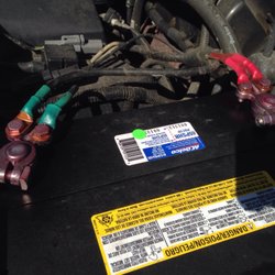R.B. Automotive Center - New battery install with clean connections.
