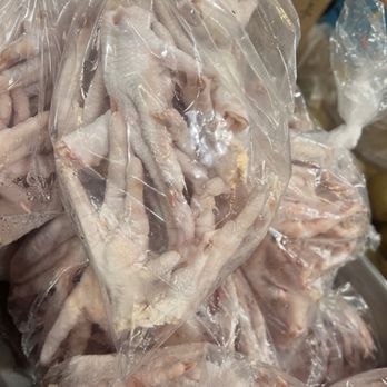 Asia Market - Looks like that chicken feet is try to throw up the West Side sign - International Grocery Near Me - San Francisco, California Asia Market - Looks like that chicken feet is try to throw up the West Side sign - International Grocery Near Me - San Francisco, California