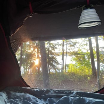 Interlochen State Park - Rooftop tent looking at sunrise on the lake - Parks Near Me - Interlochen, Michigan