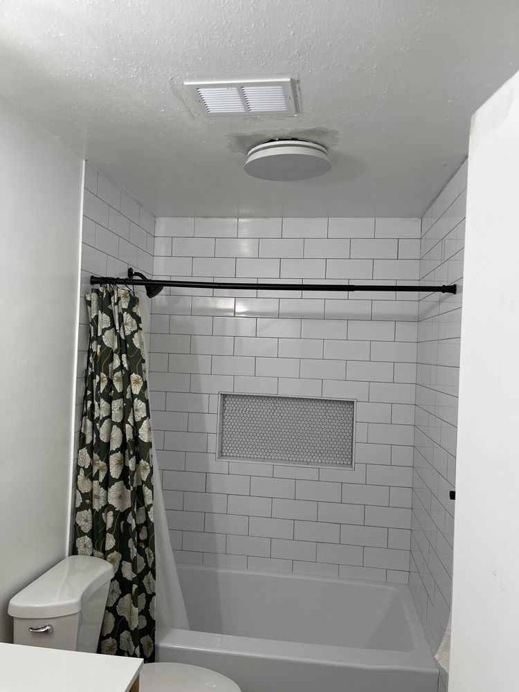 Slide of 2 Cousins Construction