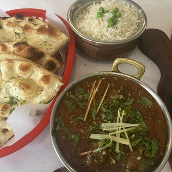Cardamom Indian Cuisine - Lamb roganjosh, basmati, Garlic Naan - Indian Near Me - Auburn, Washington Cardamom Indian Cuisine - Lamb roganjosh, basmati, Garlic Naan - Indian Near Me - Auburn, Washington