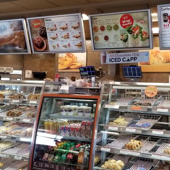 Tim Hortons - a display case of donuts - Bakeries Near Me - Belleville, Ontario Tim Hortons - a display case of donuts - Bakeries Near Me - Belleville, Ontario