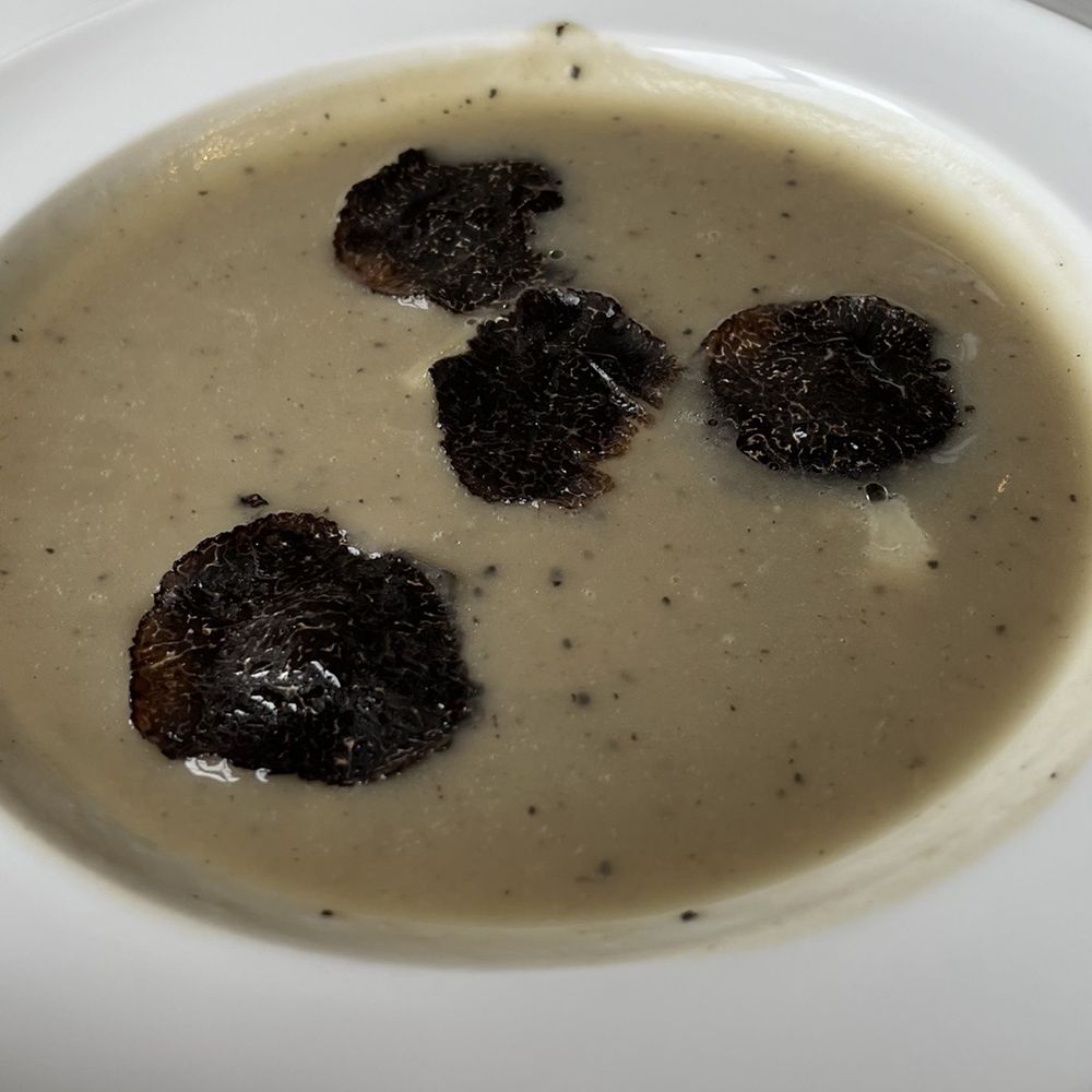 Guy Savoy - Signature artichoke soup with rich black truffle - French Near Me - Paris, 75