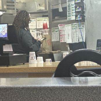 Jack in the Box - Employee on their phone while waiting for food to come out. - Burgers Near Me - Concord, North Carolina Jack in the Box - Employee on their phone while waiting for food to come out. - Burgers Near Me - Concord, North Carolina