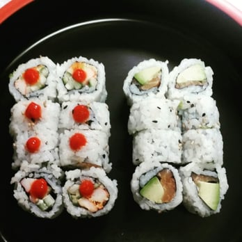 Ginza Sushi - two pieces of sushi on a plate - Sushi Bars Near Me - Winnipeg, Manitoba Ginza Sushi - two pieces of sushi on a plate - Sushi Bars Near Me - Winnipeg, Manitoba