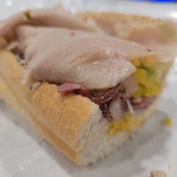 Mash Hoagies - MULCAHY: Roast beef, turkey, provolone cheese. Add whatever fillings you want. For me, lettuce, tomato, banana peppers, mustard.