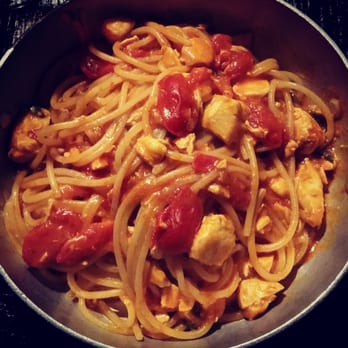Anche Ristorante - Spaghetti with salmon and tomatoes - Mediterranean Near Me - Milan, Michigan Anche Ristorante - Spaghetti with salmon and tomatoes - Mediterranean Near Me - Milan, Michigan