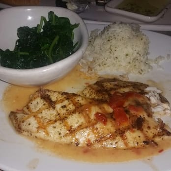 Bonefish Grill - Tilapia with lime tomato garlic sauce, jasmine rice and spinach. - Seafood Near Me - Miami, Florida Bonefish Grill - Tilapia with lime tomato garlic sauce, jasmine rice and spinach. - Seafood Near Me - Miami, Florida