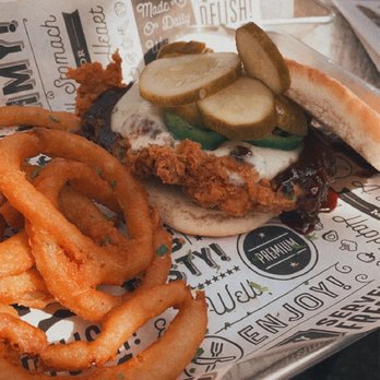 Coopers Tavern - BBBQ Blackberry BBQ Chicken Biscuit Sandwich with beer batter onion rings - Burgers Near Me - Edgewater, Maryland Coopers Tavern - BBBQ Blackberry BBQ Chicken Biscuit Sandwich with beer batter onion rings - Burgers Near Me - Edgewater, Maryland