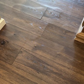Empire Today - Water damaged laminate flooring. - Carpet Installation Near Me Empire Today - Water damaged laminate flooring. - Carpet Installation Near Me