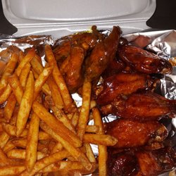Tammy's Grill - Our Delicious Chicken Wing Combo spun in our #1 Selling Mambo Sauce.