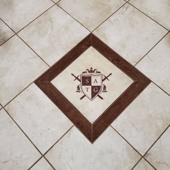 St Albert the Great Church - St. Albert the Great monogram in the tile floor - Religious Organizations Near Me - Burbank, Illinois
