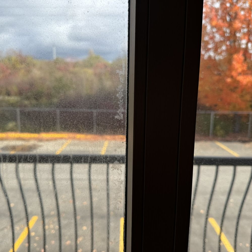 Quality Inn - Dirty glass sliding doors - Hotels Near Me - Kingston, Ontario Quality Inn - Dirty glass sliding doors - Hotels Near Me - Kingston, Ontario