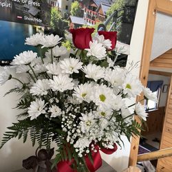 Nelson's Flower Shop - Flowers with a special meaning, daisies are our special thing in all bouquets!roses too!