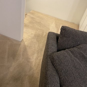 Pristine Carpet & Tile Cleaning - Living room area near stairs and wet bar "After" picture - Carpet Cleaning Near Me Pristine Carpet & Tile Cleaning - Living room area near stairs and wet bar "After" picture - Carpet Cleaning Near Me