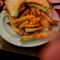 Cluck you club( sautéed mushrooms and onions, crispy bacon, tomatoes and lettuce) and really good fries Cluck you club( sautéed mushrooms and onions, crispy bacon, tomatoes and lettuce) and really good fries