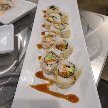 Trapper’s Sushi - a plate of sushi with sauce - Sushi Bars Near Me - Tacoma, Washington