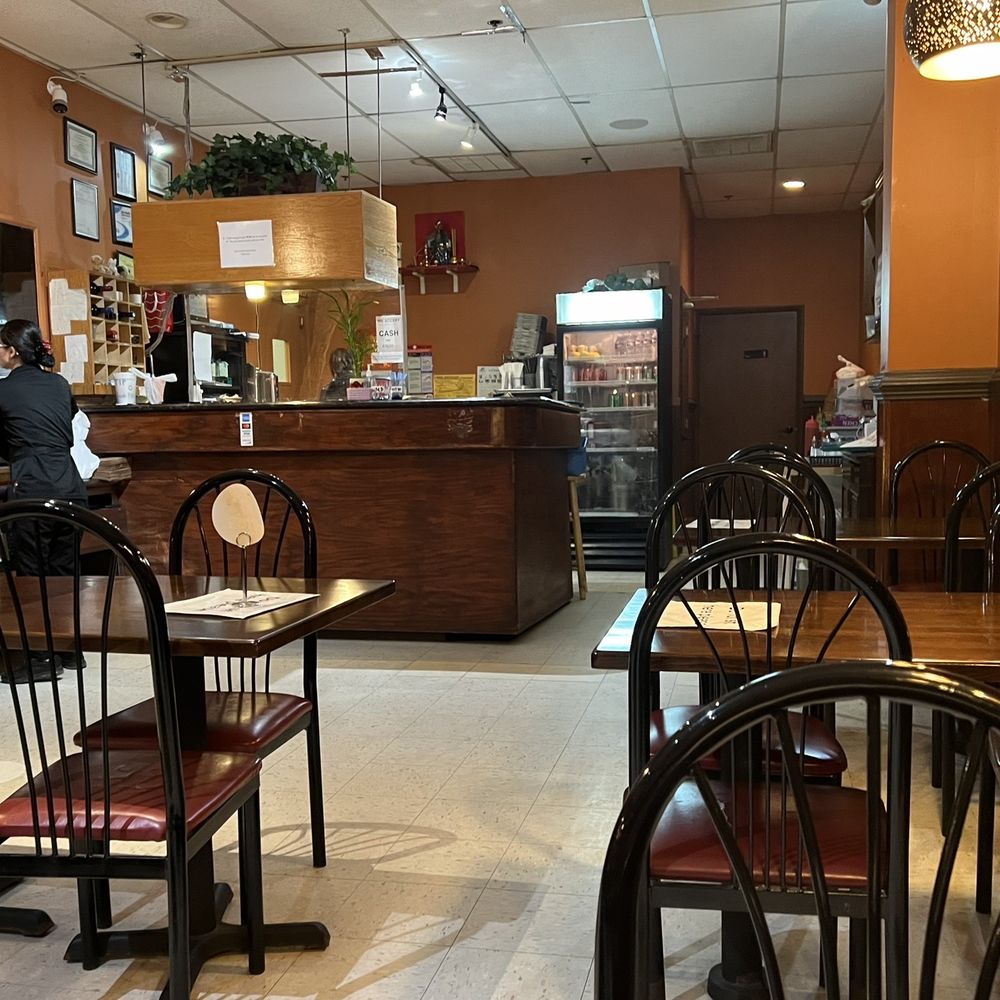 An Loi - a restaurant with tables and chairs - Vietnamese Near Me - Columbia, Maryland An Loi - a restaurant with tables and chairs - Vietnamese Near Me - Columbia, Maryland