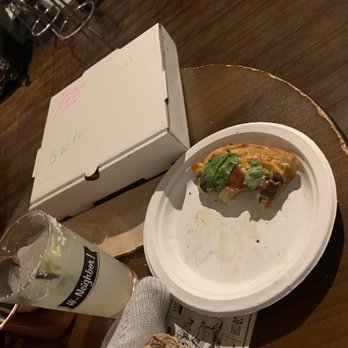 Baxter’s Speakeasy - a half eaten pizza and a drink - Cocktail Bars Near Me - Akron, Ohio