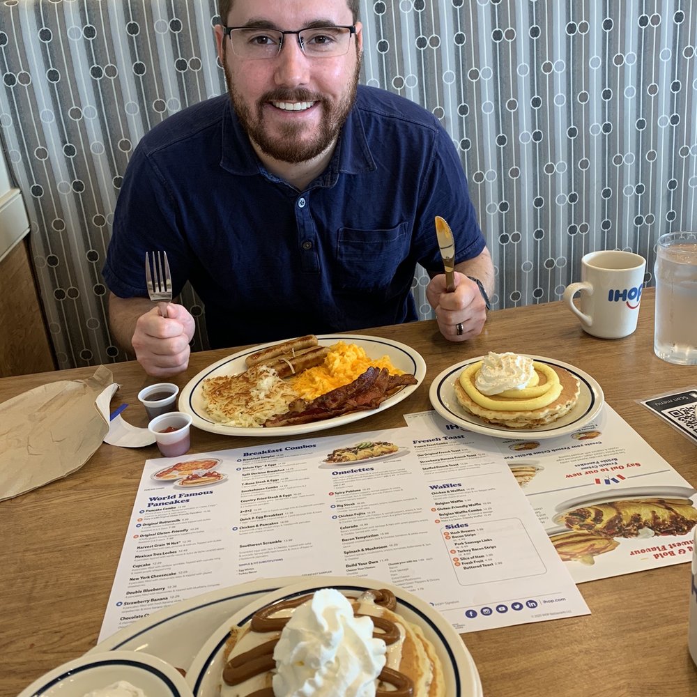 IHOP - a man sitting at a table with pancakes and waffles - Breakfast & Brunch Near Me - Medicine Hat, Alberta IHOP - a man sitting at a table with pancakes and waffles - Breakfast & Brunch Near Me - Medicine Hat, Alberta