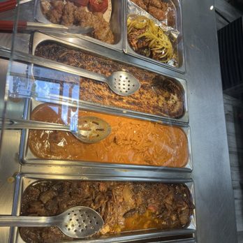 Ta'bleyah Mediterranean Cuisine - Assorted fushes like butter chicken etc. - Mediterranean Near Me - Spring, Texas
