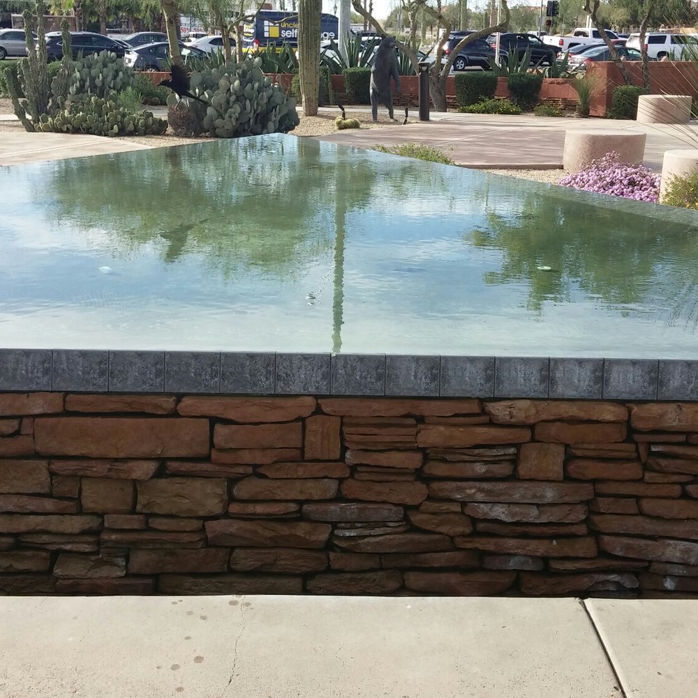 Frank Lloyd Wright Spire - Triangular Reflecting Pool: A common pattern in his desert designs. - Landmarks & Historical Buildings Near Me - Scottsdale, Arizona Frank Lloyd Wright Spire - Triangular Reflecting Pool: A common pattern in his desert designs. - Landmarks & Historical Buildings Near Me - Scottsdale, Arizona