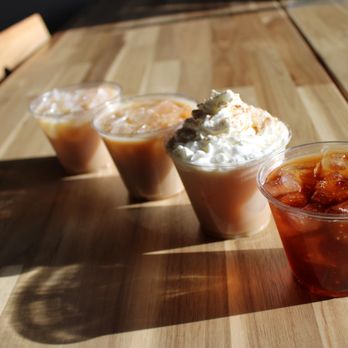TLC Coffee House - three cups of iced coffee on a wooden table - Coffee & Tea Near Me - Maroa, Illinois TLC Coffee House - three cups of iced coffee on a wooden table - Coffee & Tea Near Me - Maroa, Illinois