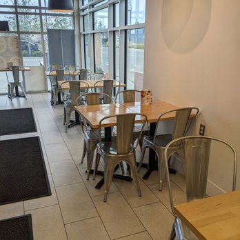 Freshii - tables and chairs in a restaurant - Vegetarian Near Me - Edmonton, Alberta Freshii - tables and chairs in a restaurant - Vegetarian Near Me - Edmonton, Alberta