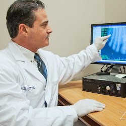 Absolute Foot Care Specialists - Dr. Levine reviewing a patients x-ray