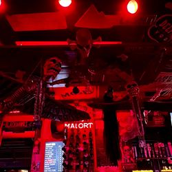Red Door Saloon - Red/skeletal decor