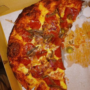 Lela's Pizzeria - a half eaten pizza - Pizza Near Me - Fresno, California Lela's Pizzeria - a half eaten pizza - Pizza Near Me - Fresno, California