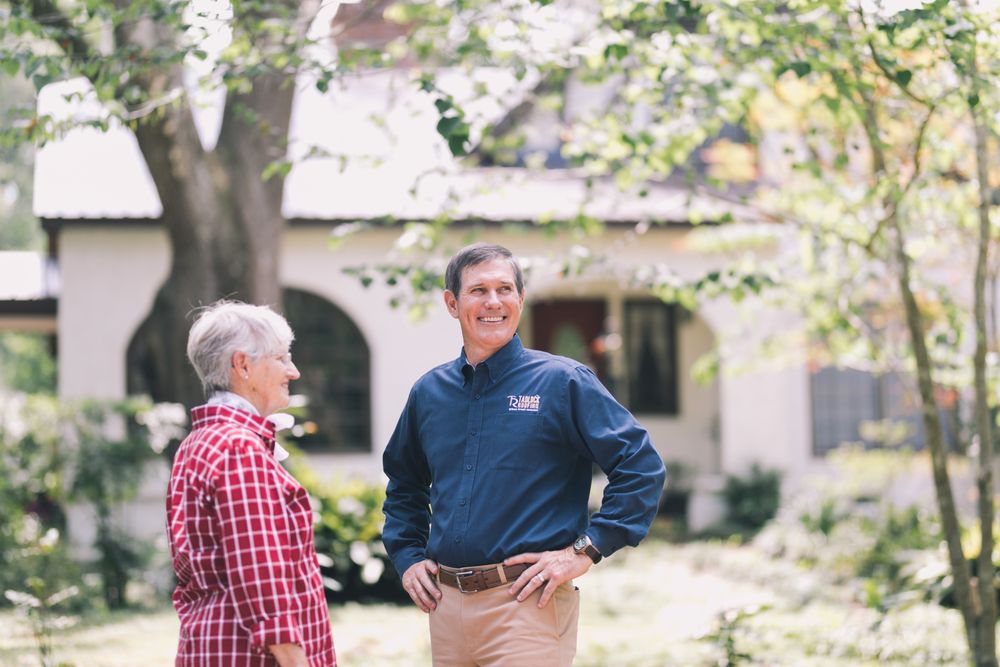 Slide of Tadlock Roofing