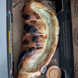 Big Mama's & Papa's Pizzeria - Deluxe Calzone with mystery Indian sause