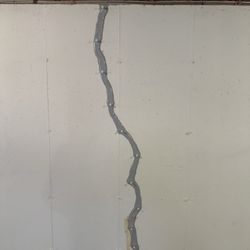 Crack-X - Vertical crack filled in foundation.