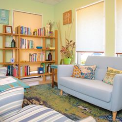 Thrive Acupuncture and Wellness - Waiting area with lending library