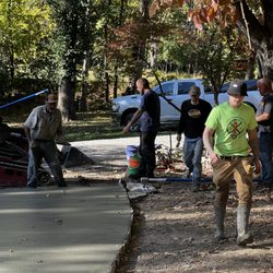 Artisan Stone Products - Guys are working hard on this concrete drive!