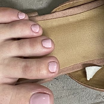 V-Tech Nails and Spa - You can see where she went in with the drill and took out parts off of the nail polish/pinky shows how bad the work was - Nail Salons Near Me - Fresno, California