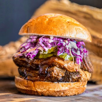 The Bone Shop - Slow smoked moist brisket burger - Food Delivery Services Near Me The Bone Shop - Slow smoked moist brisket burger - Food Delivery Services Near Me