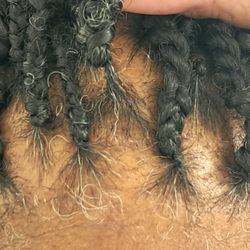 Tess African Hair - Slipping twists and inconsistent twisting techniques used on each section