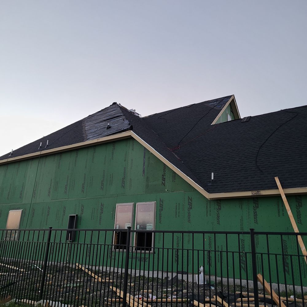 Slide of Quantum Roofing and Construction