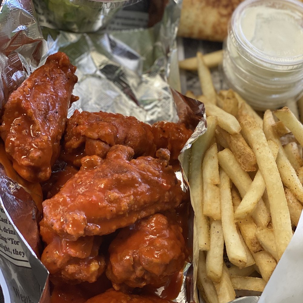JLB Eatery - Traditional Hot Wings come with a lil side salad and fries - Burgers Near Me - Tomball, Texas